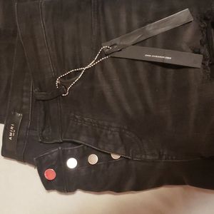 Mike Amiri distressed black jeans with multi color patches never worn